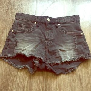 Distressed black jean shorts